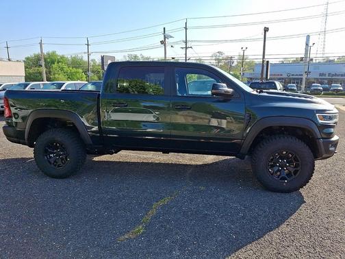 Serrano-Green Metallic Exterior Paint 2026 RAM 1500 RHO Crew Cab 4x4 5'7' Box