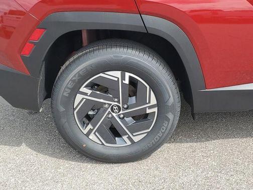 Red 2026 Hyundai TUCSON Hybrid Blue SE