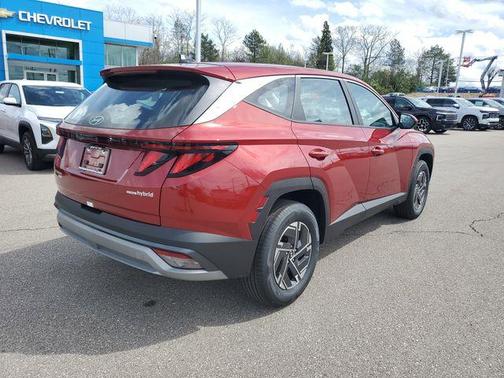 Red 2026 Hyundai TUCSON Hybrid Blue SE