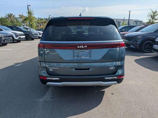 Blue 2024 Kia Carnival EX