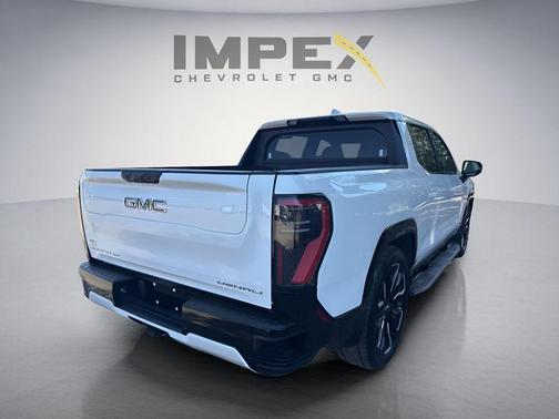 Summit White 2025 GMC Sierra EV Extended Range Denali