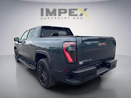 Deep Ocean Metallic 2026 GMC Sierra EV Extended Range Elevation