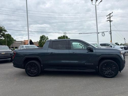 Deep Ocean Metallic 2026 GMC Sierra EV Extended Range Elevation