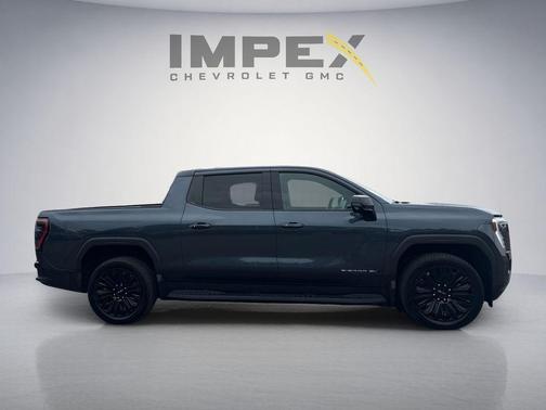 Deep Ocean Metallic 2026 GMC Sierra EV Extended Range Elevation