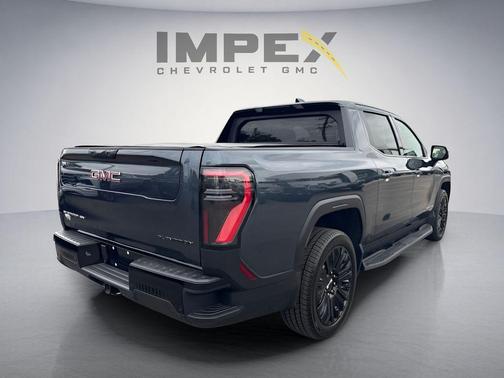 Deep Ocean Metallic 2026 GMC Sierra EV Extended Range Elevation