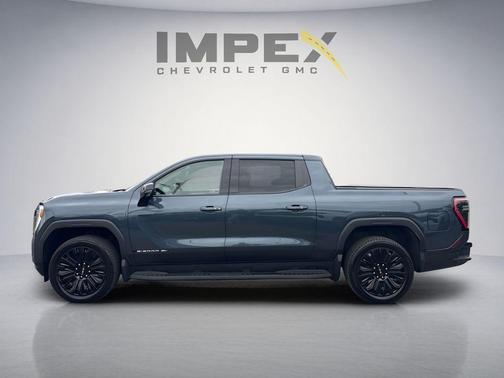Deep Ocean Metallic 2026 GMC Sierra EV Extended Range Elevation