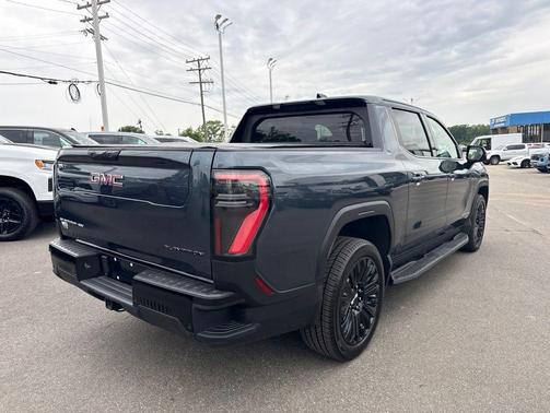 Deep Ocean Metallic 2026 GMC Sierra EV Extended Range Elevation