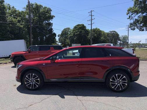 Radiant Red Tintcoat 2025 Cadillac OPTIQ Sport 2 AWD