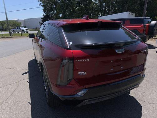 Radiant Red Tintcoat 2025 Cadillac OPTIQ Sport 2 AWD