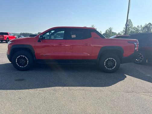 Orange 2026 Chevrolet Silverado EV Trail Boss - Max Range