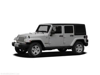 Bright Silver Metallic Clearcoat 2011 Jeep Wrangler Unlimited Sport