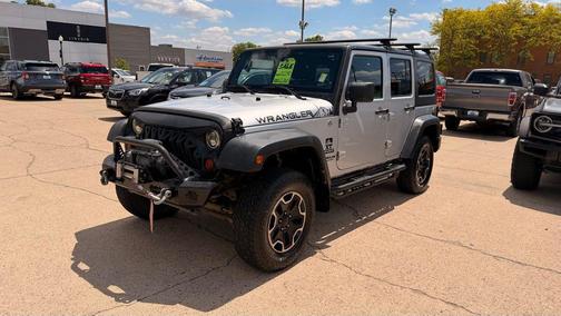 Bright Silver Metallic Clearcoat 2011 Jeep Wrangler Unlimited Sport