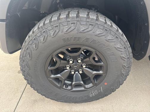 Serrano Green Metallic 2026 RAM 1500 RHO Crew Cab 4x4 5'7' Box