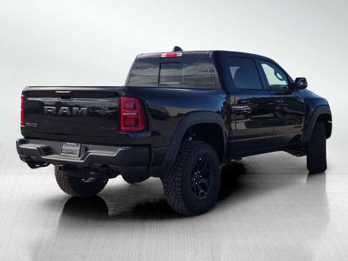 Diamond Black Crystal Pearlcoat 2026 RAM 1500 RHO Crew Cab 4x4 5'7' Box