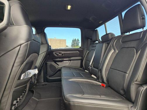 Diamond Black Crystal Pearlcoat 2026 RAM 1500 RHO Crew Cab 4x4 5'7' Box