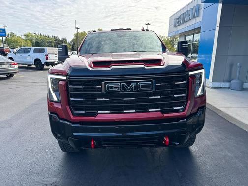 Volcanic Red Tintcoat 2026 GMC Sierra 2500 AT4X