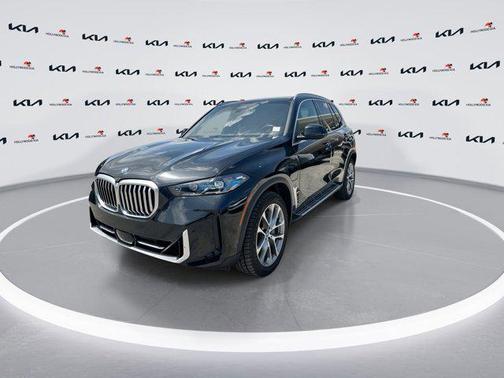 Black Sapphire Metallic 2024 BMW X5 PHEV xDrive50e