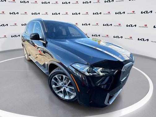 Black Sapphire Metallic 2024 BMW X5 PHEV xDrive50e