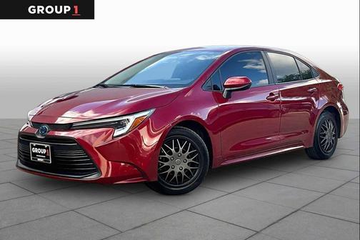 Ruby Flare Pearl 2025 Toyota Corolla Hybrid LE
