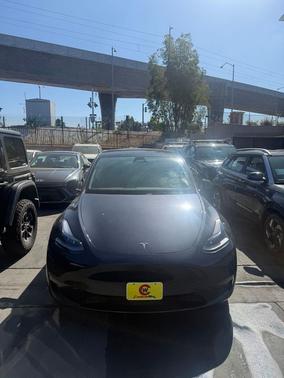 Solid Black 2024 Tesla Model Y Performance Dual Motor All-Wheel Drive
