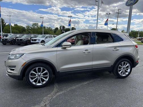 Gold Metallic 2015 Lincoln MKC Base