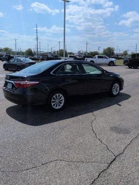 Midnight Black Metallic 2016 Toyota Camry Hybrid LE