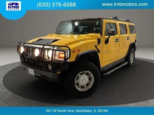 Yellow 2003 Hummer H2