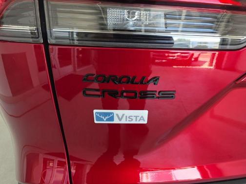 Soul Red Crystal 2026 Toyota Corolla Hybrid SE