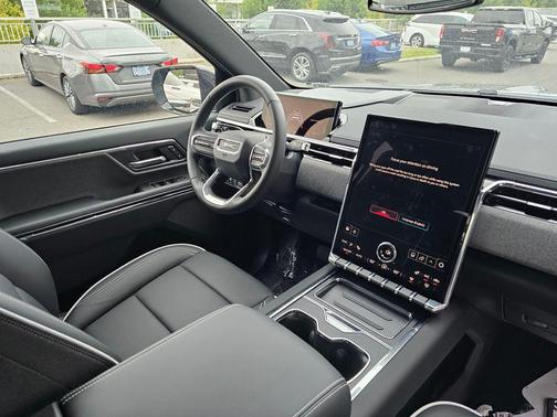 Deep Ocean Metallic 2026 GMC Sierra EV Standard Range Elevation