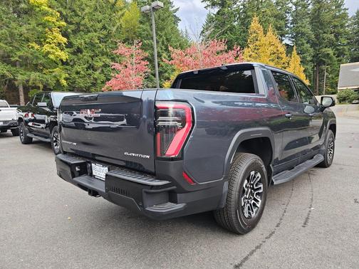 Deep Ocean Metallic 2026 GMC Sierra EV Standard Range Elevation