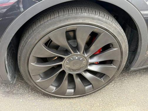 Solid Black 2024 Tesla Model Y Performance Dual Motor All-Wheel Drive