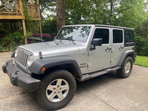 Bright Silver Metallic Clearcoat 2012 Jeep Wrangler Unlimited Sport