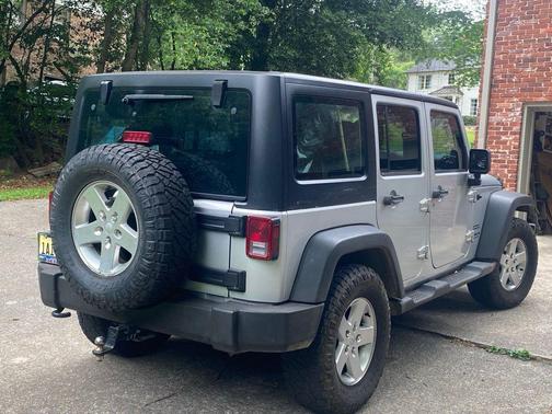 Bright Silver Metallic Clearcoat 2012 Jeep Wrangler Unlimited Sport