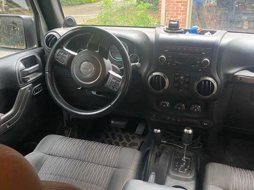 Bright Silver Metallic Clearcoat 2012 Jeep Wrangler Unlimited Sport