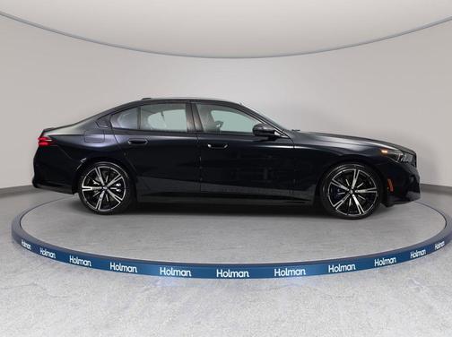 Carbon Black Metallic 2026 BMW 550e xDrive