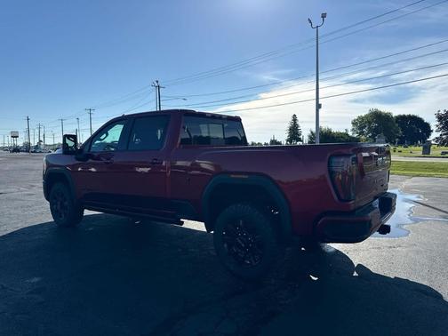Volcanic Red Tintcoat 2026 GMC Sierra 3500 AT4