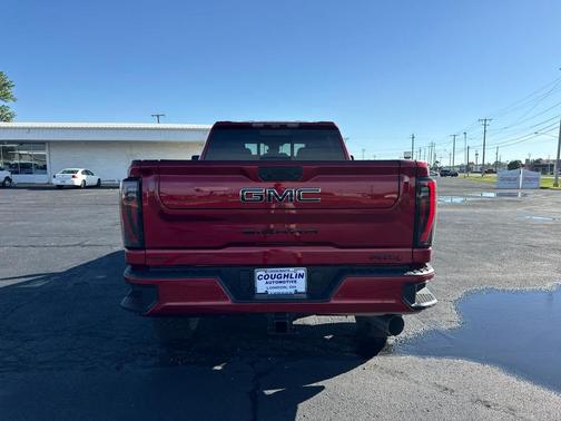 Volcanic Red Tintcoat 2026 GMC Sierra 3500 AT4