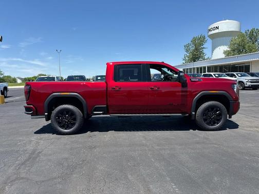 Volcanic Red Tintcoat 2026 GMC Sierra 3500 AT4
