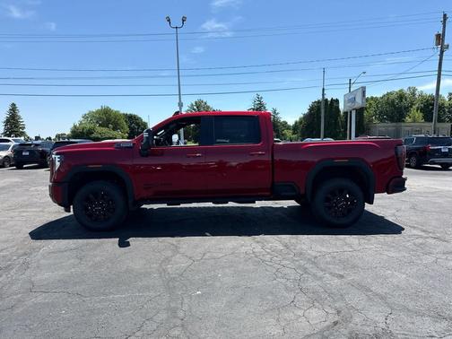 Volcanic Red Tintcoat 2026 GMC Sierra 3500 AT4
