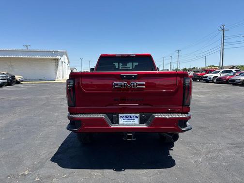 Volcanic Red Tintcoat 2026 GMC Sierra 3500 AT4