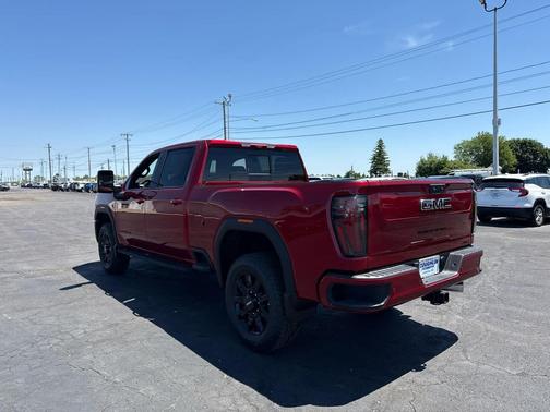 Volcanic Red Tintcoat 2026 GMC Sierra 3500 AT4