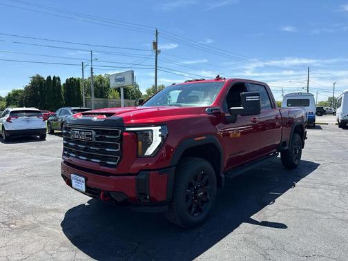 Volcanic Red Tintcoat 2026 GMC Sierra 3500 AT4