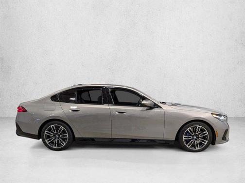 Oxide Grey Metallic 2026 BMW 550e xDrive
