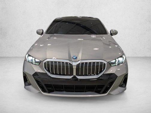 Oxide Grey Metallic 2026 BMW 550e xDrive