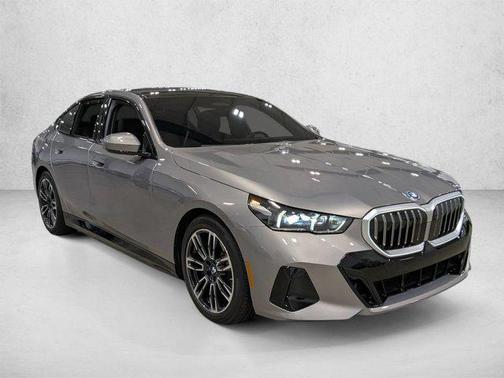Oxide Grey Metallic 2026 BMW 550e xDrive