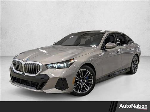 Oxide Grey Metallic 2026 BMW 550e xDrive