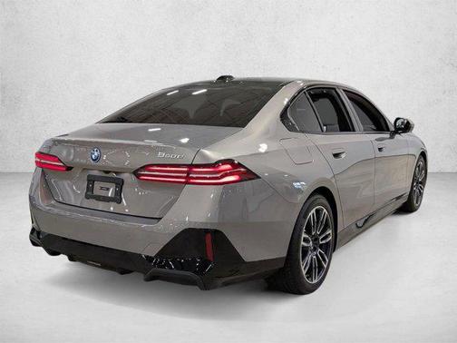 Oxide Grey Metallic 2026 BMW 550e xDrive