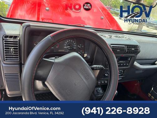 Flame Red Clear Coat 1999 Jeep Wrangler Sport