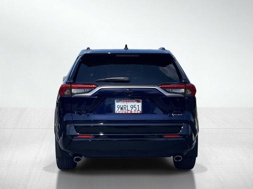 Blueprint/Midnight Black Metallic 2025 Toyota RAV4 Hybrid SE