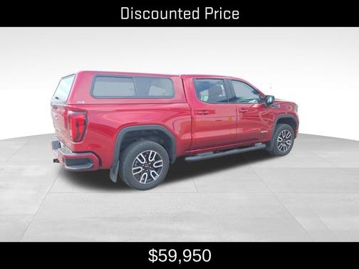 Volcanic Red 2025 GMC Sierra 1500 AT4